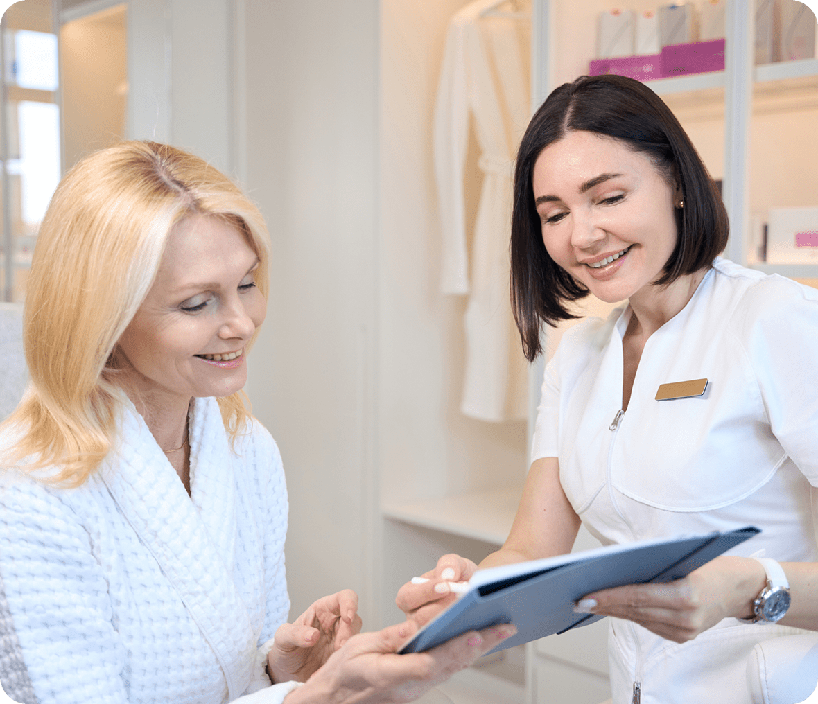 Client and consultant reviewing skincare options