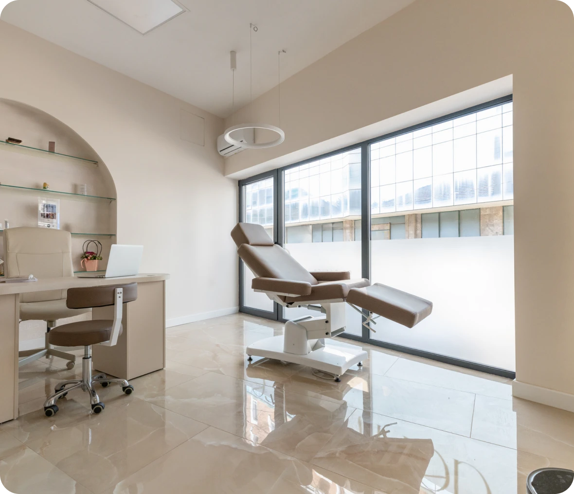 Modern medical office with examination chair