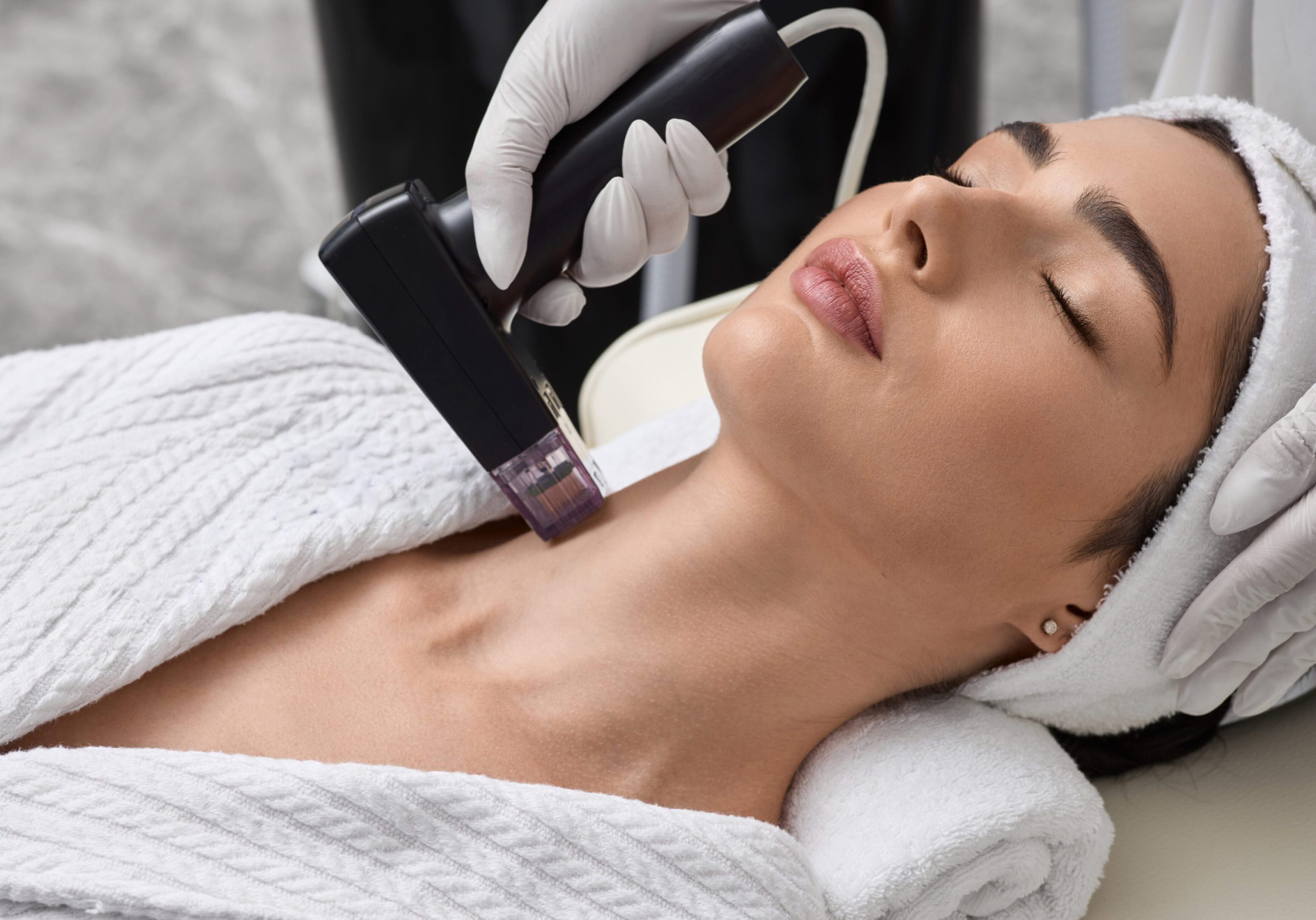 Facial treatment with laser device